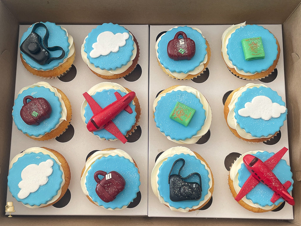 Travel themed cucpakes 