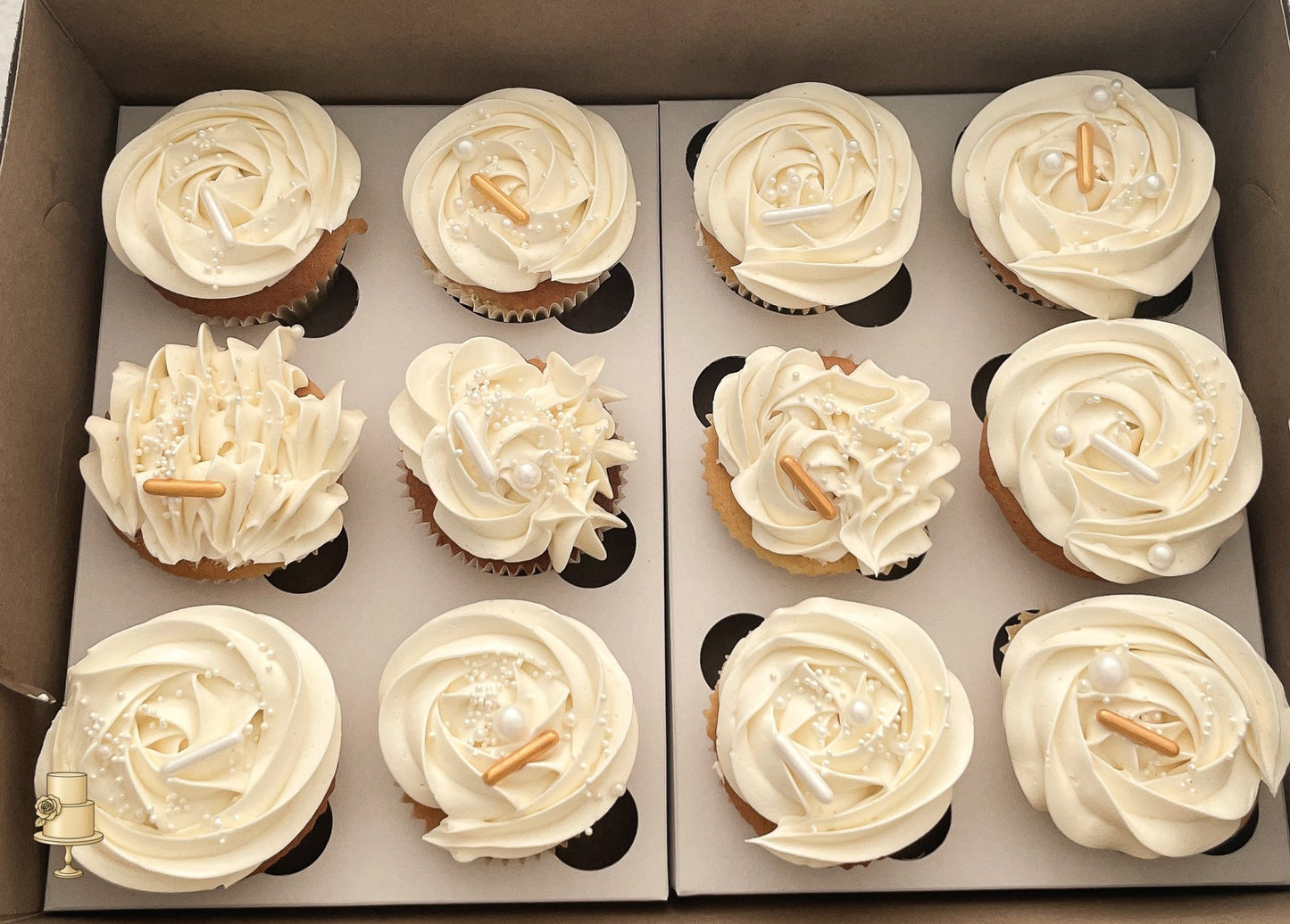 Buttercream cupcakes with pearl decorations