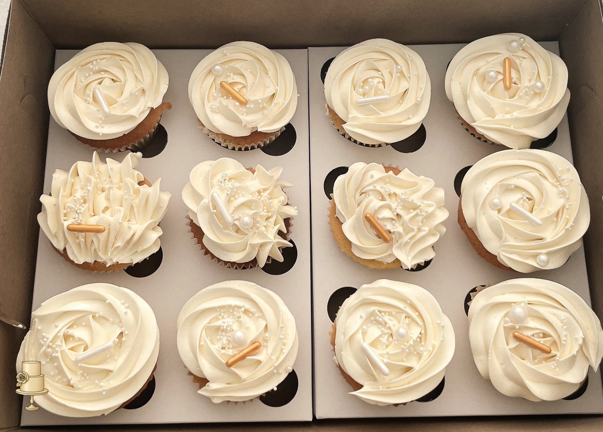 Buttercream cupcakes with pearl decorations