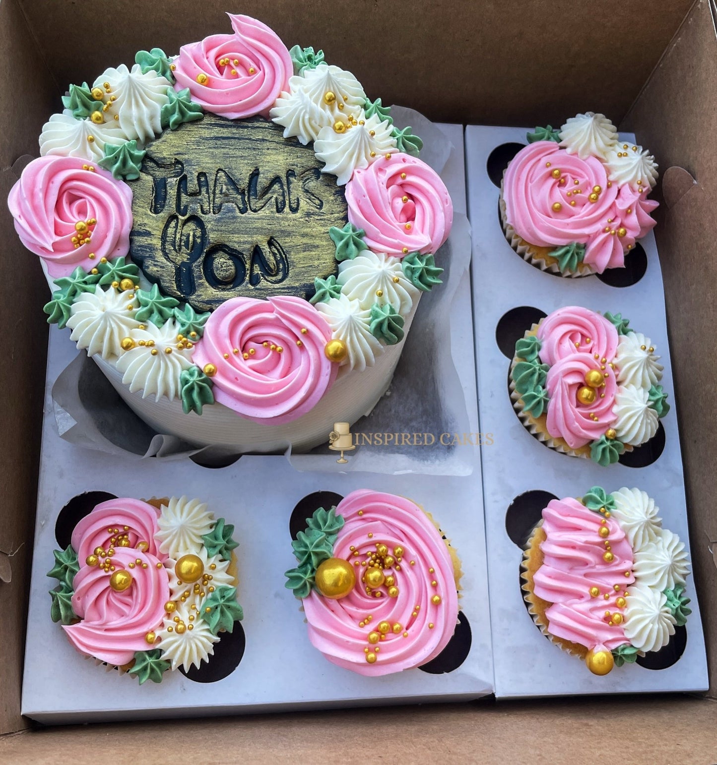 Pink and white bento cake and cupcakes
