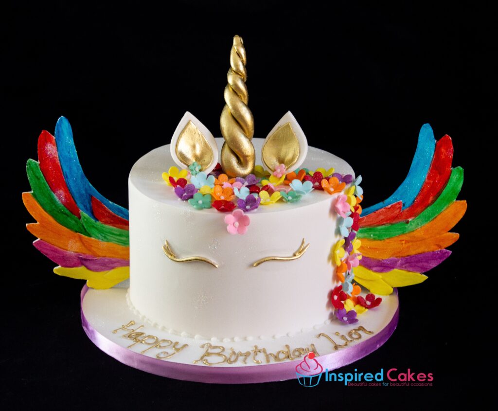 Unicorn round cake colourful wings
