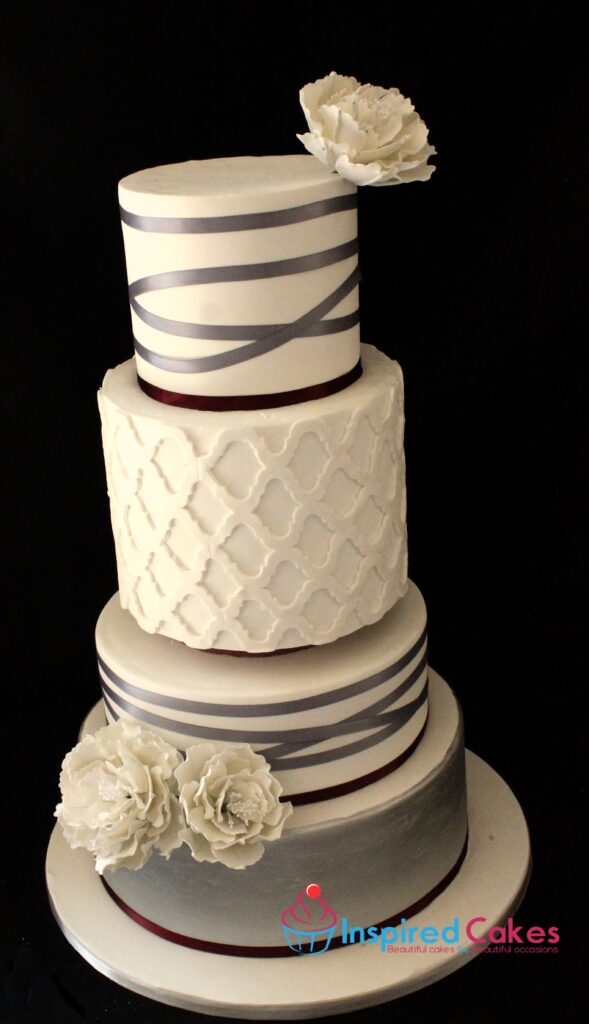 4 tier ribbons lace and flowers wedding cake